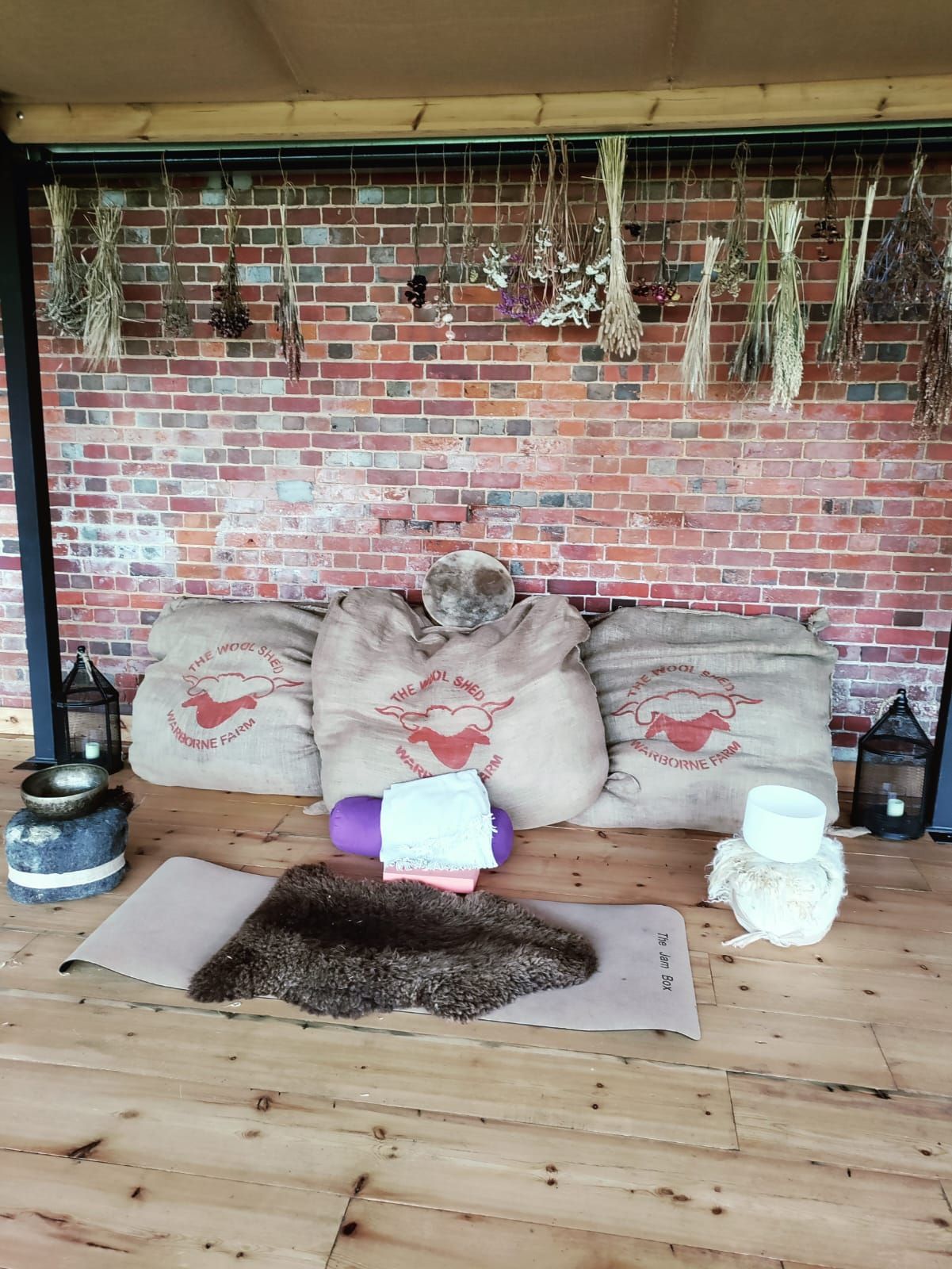 Rustic yoga and sound bath space at the organic farm
