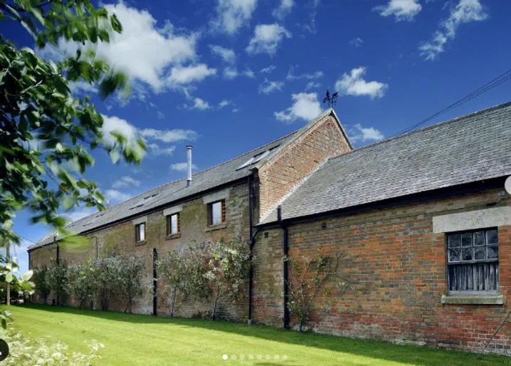 Peaceful exterior of a converted barn at the New Forest farm retreat