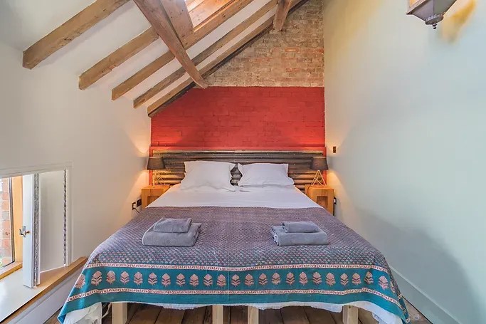 Cosy bedroom in a converted New Forest retreat barn